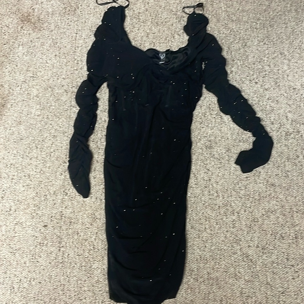 Black sequenced formal dress. Never worn, but tags removed.